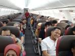 Tips Naik Pesawat - Inilah 10 Barang Ajaib yang Bisa Mengusir Bosan Saat Perjalanan