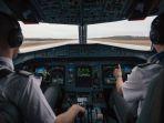 ilustrasi-pilot-mengemudikan-pesawat.jpg