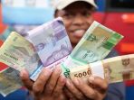 jasa-penukaran-uang-baru_20180611_201812.jpg