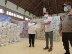 kemenprekraf-dan-mnc-group-bekerjasama-dengan-polda-bali-menyerahkan-bantuan-sembako.jpg