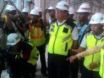 menteri-bumn-rini-soemarno-dirut-ap-i-faik-fahmi-dan-manajer-proyek-nyia-dari-ap-i-tauchid-p.jpg