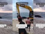 mobil-pajero-berwarna-hitam-terjebak-di-pantai-timbis.jpg