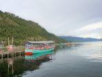 naik-kapal-untuk-nikmati-pemandangan-Danau-Laut-Tawar-tempat-wisata-populer-di-Aceh.jpg