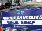 papan-yang-menunjukkan-aturan-ganjil-genap.jpg