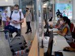 pelancong-diproses-di-aula-kedatangan-internasional-di-bandara-internasional-ngurah-rai.jpg