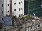 9 Pemandangan Paling Mengejutkan yang Pernah Ditangkap Fotografer dari Atas Rooftops Hong Kong