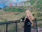 pengunjung-yang-berfoto-dengan-latar-belakang-ikon-cicalengka-dreamland.jpg