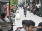 pesepeda-menggunakan-masker-saat-beraktivitas-di-kawasan-malioboro.jpg