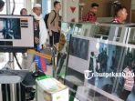 petugas-sedang-memantau-alat-pendeteksi-suhu-tubuh-thermal-scanner.jpg