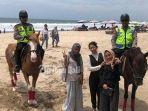 polisi-berkuda-di-pantai-kuta-bali.jpg