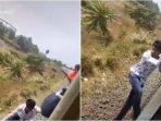pria-bergelantungan-di-kereta.jpg