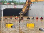 sekitar-15-mobil-terjebak-di-air-banjir-setelah-hujan-lebat-di-cheongju.jpg