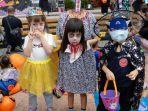 seorang-gadis-dengan-kostum-hantu-tanpa-kepala-untuk-rayakan-halloween.jpg