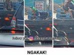 seorang-pria-melakukan-gerakan-aneh-di-mobil-truk-viral-di-media-sosial.jpg