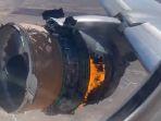 united-flight-328-terbakar.jpg