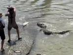 viral-video-pria-memancing-ikan-yang-jadi-incaran-buaya.jpg