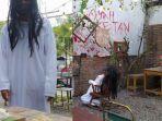 warkop-ketan-di-surabaya-menghadirkan-suasana-horor-lengkap-dengan-sejumlah-replika-hantu.jpg