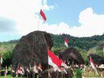 watu-gendong-saat-acara-pengibaran-seribu-bendera-merah-putih-pada-28-oktober-silam.jpg