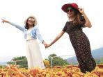 wisatawan-yang-sedang-berfoto-di-batu-love-garden.jpg