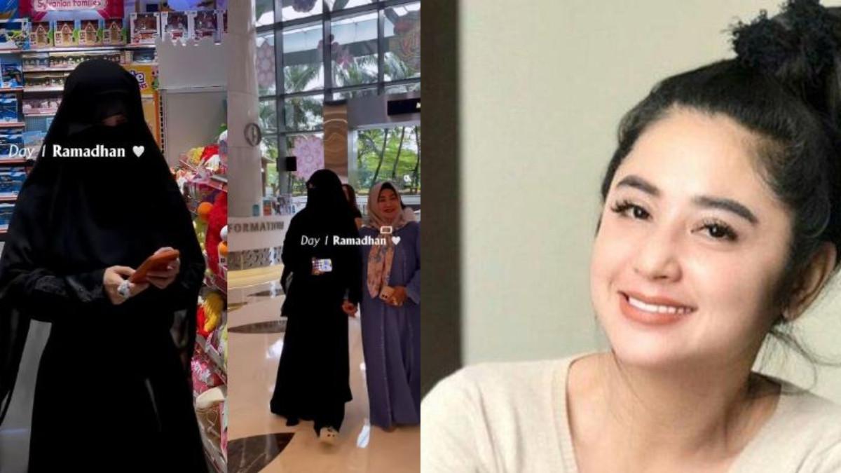 DEWI PERSSIK - Di bulan Ramadhan ini Dewi Perssik tiba-tiba tampil beda dengan mengenakan cadar hitam saat berbelanja di supermarket.