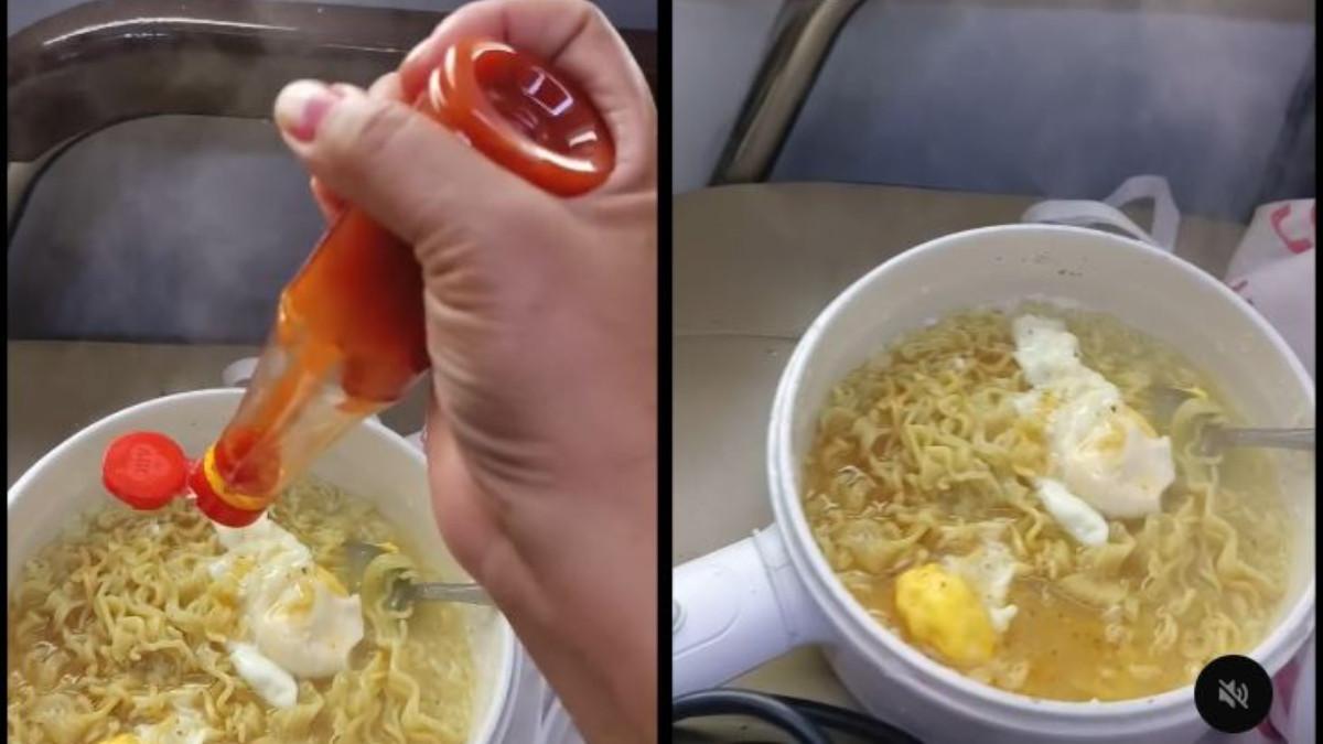MEMASAK DI KERETA - Viral seorang penumpang kereta api memasak mie instan di gerbong