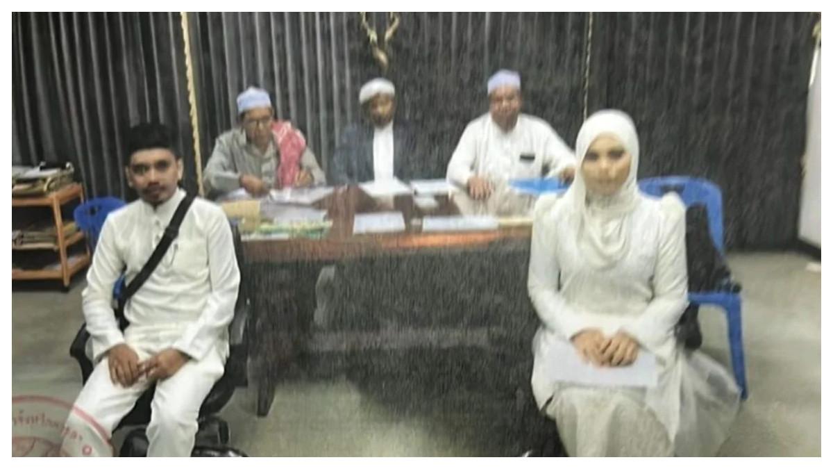Gambar-gambar yang dibagikan secara daring yang diduga menunjukkan pasangan duduk di hadapan pejabat agama, yang dikutip dalam unggahan media sosial yang menuduh seorang wanita telah menikahi pria kedua di Thailand. Otoritas agama Malaysia telah mengkonfirmasi bahwa wanita tersebut bukanlah seorang bigamis.