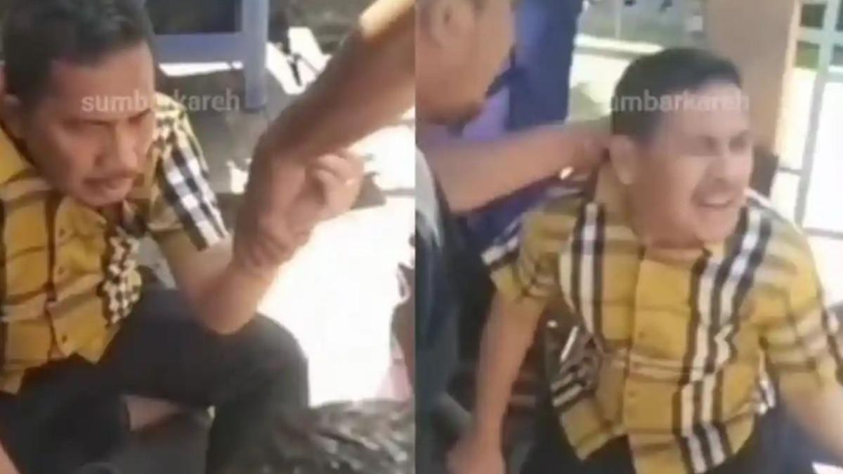 EKS BUPATI DIAMANKAN - Tangkapan layar video yang menarasikan mantan Bupati Dharmasraya berinisial AG diamankan warga di Kelurahan Air Tawar Barat, Kecamatan Padang Utara, Kota Padang, Sumatera Barat (Sumbar) karena diduga melakukan hubungan menyimpang di kamar hotel. Mantan Bupati tersebut diamankan setelah check in bareng pria muda.