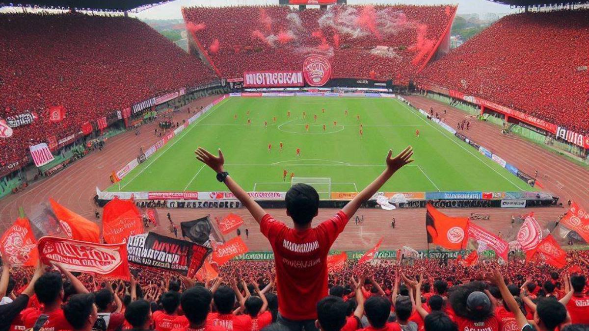 PERTANDINGAN-SEPAK-BOLA-Ilustrasi-suporter-sedang-mendukung-PSM-Makassar.jpg