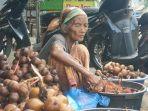 Mbok-Ti-penjual-buah-salah-dan-rambutan-jadi-korban-uang-palsu.jpg