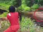 dua-pria-di-nunukan-lemparkan-anjing-ke-buaya.jpg