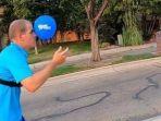 seorang-pria-pecahkan-rekor-dunia-dengan-mendorong-balon-di-wajahnya.jpg