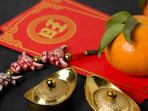 simbol-shio-dalam-ramalan-Tionghoa-jeruk-dan-angpao.jpg