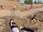 viral-segerombolan-turin-melakukan-hal-unik-gali-pasir-bak-kuburan-untuk-mandi-pasir.jpg