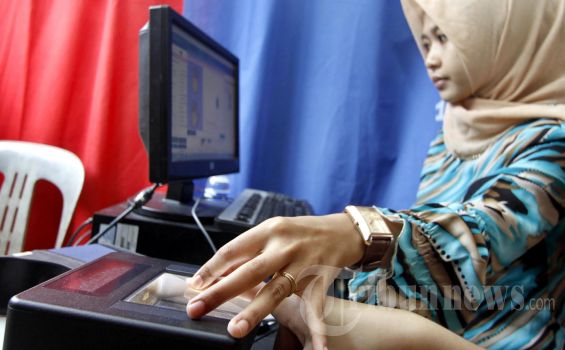 TKI di Malaysia Diminta Pulang untuk Bikin E-KTP