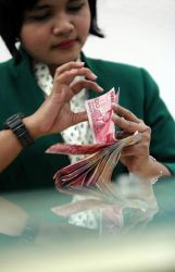Simpanan Nasabah Dengan Simpanan di Aatas Rp 5 Miliar Bulan Juli Susut 6 Persen
