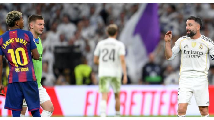 LAMINE YAMAL - Adu mulut antara Lamine Yamal vs Dani Carvajal setelah berakhirnya laga El Clasico jilid pertama musim ini yang dimenangkan Real Madrid dengan skor 2-1 di Santiago Bernabeu, Minggu (26/10/2025).