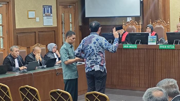 AHOK BERSAKSI - Sidang kasus dugaan korupsi tata kelola minyak mentah dan produk kilang PT Pertamina (Persero), PN Tipikor Jakpus, pada Selasa (27/1/2026). Komisaris Utama (Komut) Pertamina periode 2019-2024, Basuki Tjahaja Purnama atau Ahok jadi saksi.