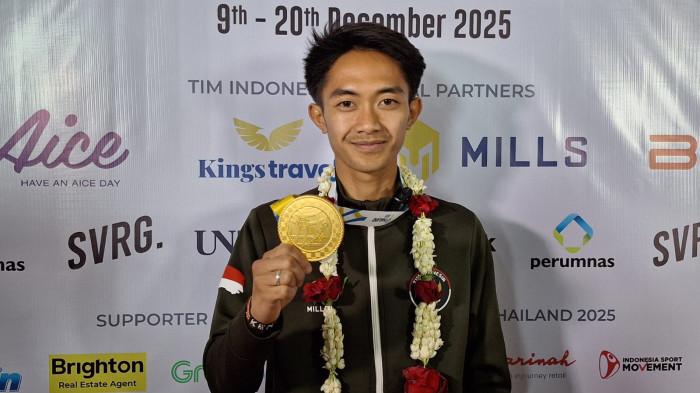 EMAS PERDANA - Pelari jarak jauh Indonesia, Robi Syanturi