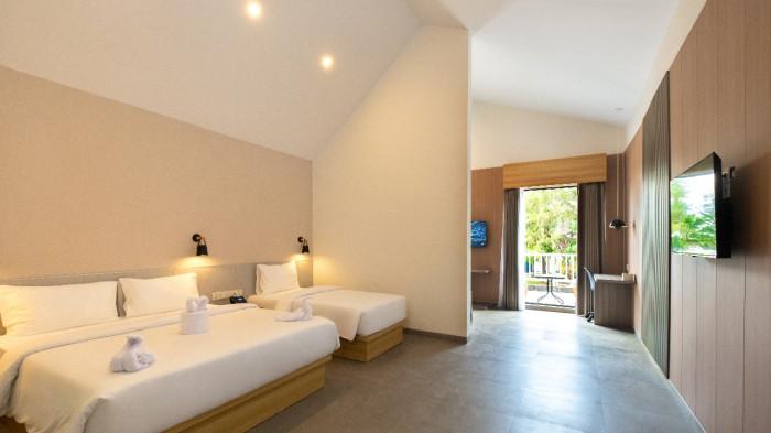 JUNIOR SUITE - Junior Suite di Hotel Bintang 4 Ayola Signature Ocarina Batam menghadirkan ruang luas dengan desain elegan, cocok untuk tamu yang menginginkan kenyamanan lebih saat berbisnis maupun berlibur.