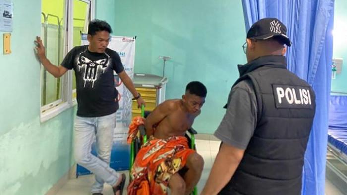 BACOK WARGA - Reski Kelvin Nando (26), warga Desa Dawas, Kecamatan Keluang, Kabupaten Musi Banyuasin (Muba) ngamuk bacok 3 warga di dua kecamatan. Akibatnya satu orang tewas, dua korban luka berat.