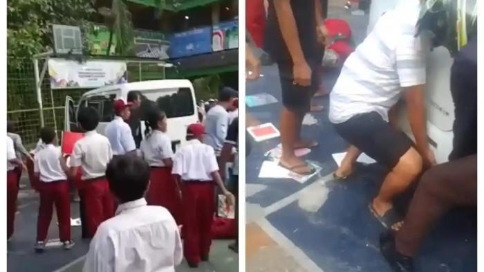 MOBIL MBG TABRAK SISWA - Warga dan guru berupaya mengevakuasi siswa SDN Kalibaru yang terjebak usai mobil MBG menyeruduk halaman sekolah.