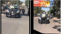 Inilah Identitas Polisi yang Viral Karena Menghentikan Pengendara Sampai Naik Ke Kap Mobil