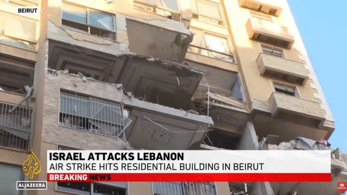 PERANG IRAN - Tangkap layar Al Jazeera English 11 Maret 2026, menampilkan serangan Israel di sebuah gedung di Beirut, Lebanon. Ini 5 skenario bagaimana perang di Iran berakhir.