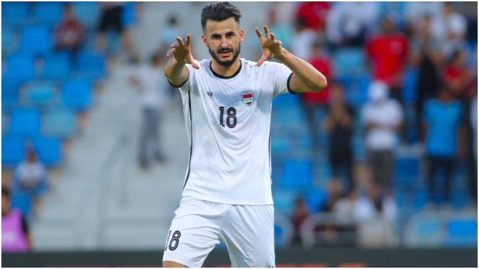 Pemain Irak, Aymen Hussein melakukan selebrasi setelah mencetak gol ke gawang Jepang pada matchday kedua Piala Asia, Jumat (19/1/2024).