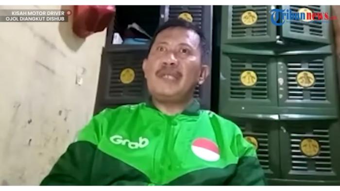 MOTOR DIANGKUT DISHUB - Driver ojol bernama Sulis Agung Wibowo yang motornya diangkut petugas Sudinhub Jakarta Timur dalam wawancara Tribunnews On Focus dipandu host Maria Nanda dari Studio Tribunnews Solo, Karanganyar, Jawa Tengah, tayang Senin (22/6/2026) di kana YouTube Tribunnews. Selain motor, Sulis juga mendapatkan handphone baru dan uang pendidikan untuk anak-anaknya sekolah.