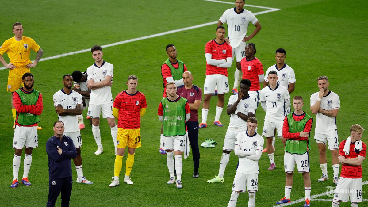 Ekspresi kesedihan para pemain Inggris usai pertandingan final sepak bola UEFA Euro 2024 melawan Spanyol di Olympiastadion di Berlin pada 14 Juli 2024. (Photo by Odd ANDERSEN / AFP)