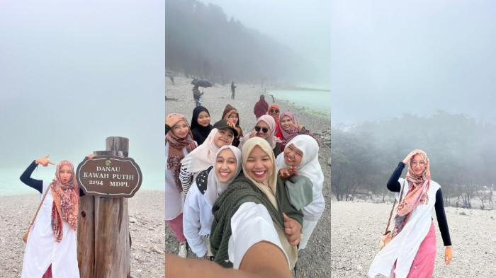 Menikmati keindahan kawah putih di Bandung.
