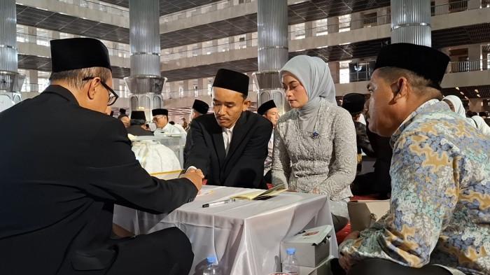 NIKAH MASSAL - Acara nikah massal bertajuk 'Nikah Fest' di Masjid Istiqlal, Jakarta, Kamis (4/9/2025).