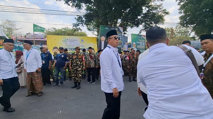 MUKTAMAR NU - Menteri Agraria dan Tata Ruang/Kepala BPN, Nusron Wahid saat tiba di Lapangan Untung Surapati yang berada dekat kawasan Pondok Pesantren Bahrul Ulum Tambakberas, Jombang, Jawa Timur, Kamis (27/8/2026).