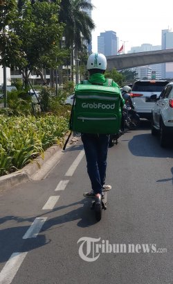 Survei: Aplikasi Grab Bikin Orang Nganggur Jadi Punya Pemasukan Hingga 10 Juta Per Bulan